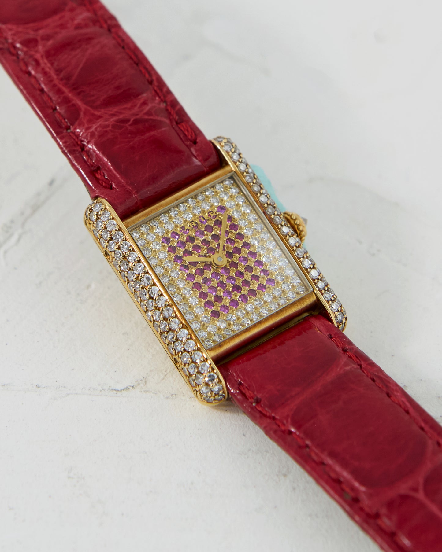 CARTIER TANK LOUIS FACTORY DIAMOND AND RUBY CASE & DIAL IN YELLOW GOLD