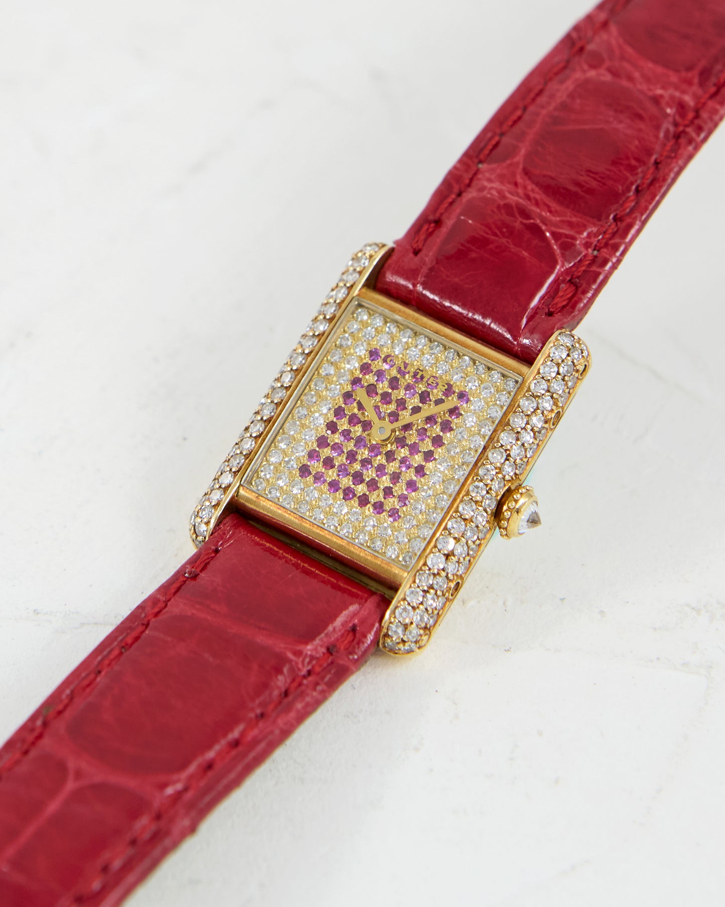 CARTIER TANK LOUIS FACTORY DIAMOND AND RUBY CASE & DIAL IN YELLOW GOLD