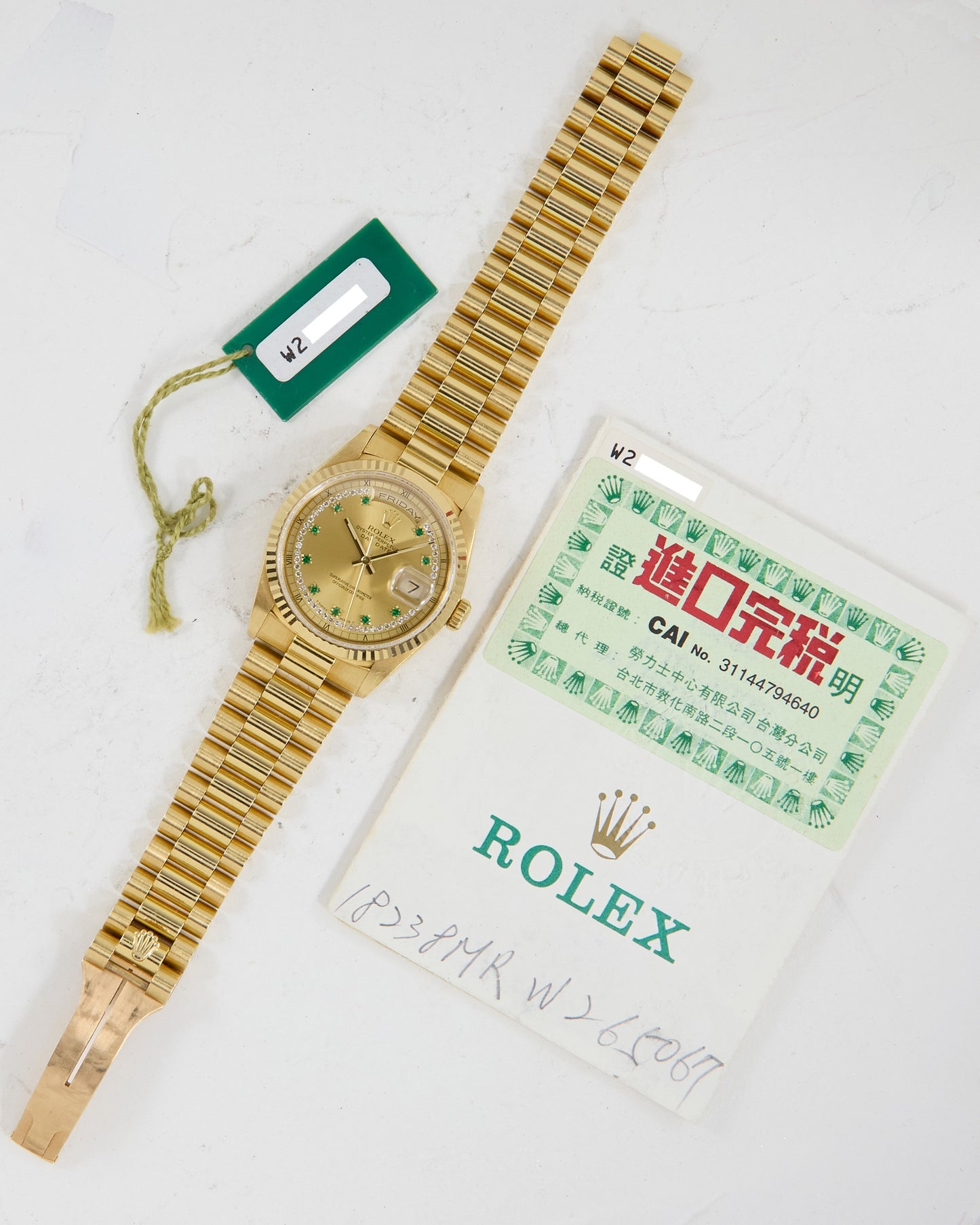ROLEX DAY-DATE DIAMOND STRING EMERALD INDEX DIAL WITH PAPERS