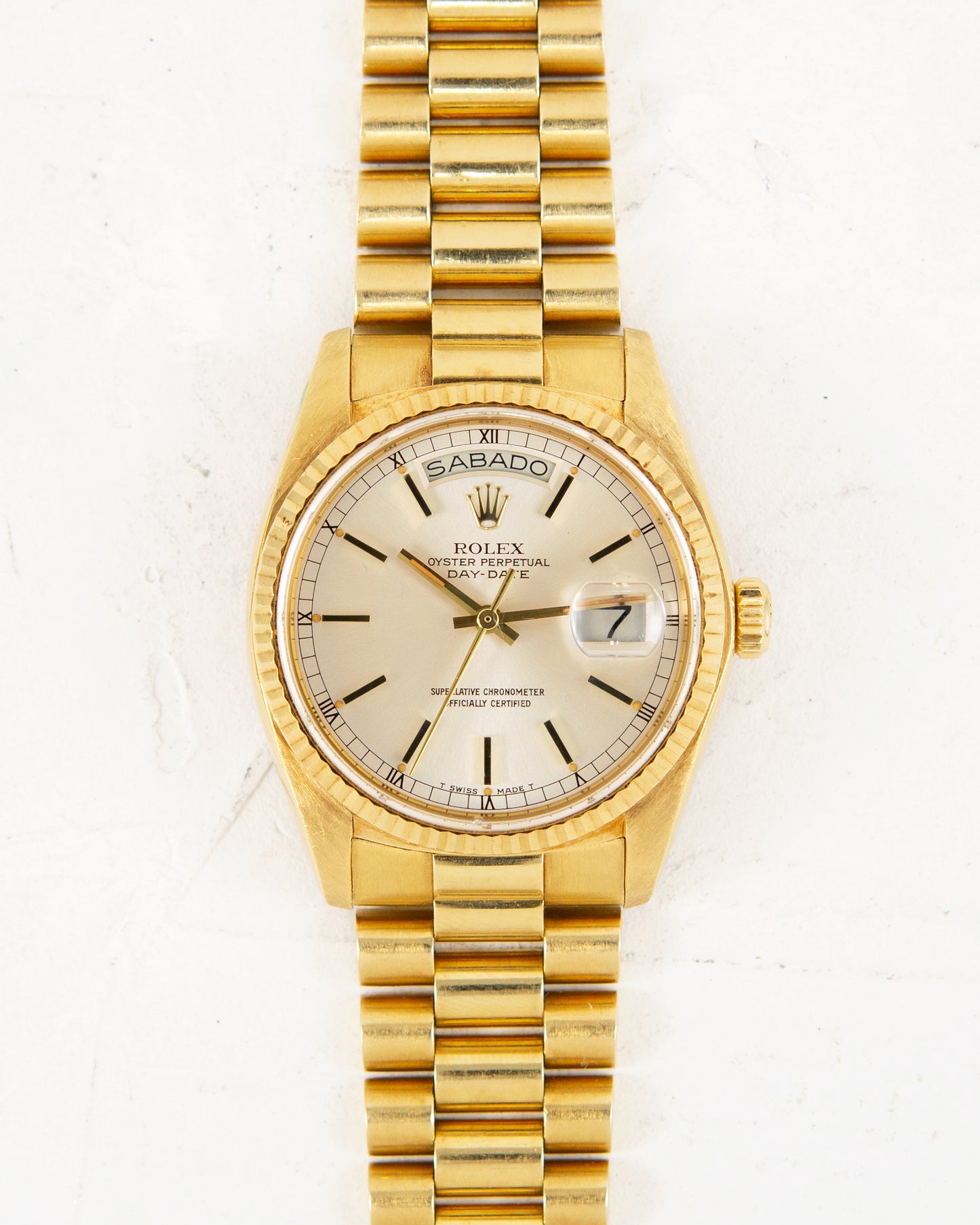 ROLEX DAY-DATE SILVER DIAL IN YELLOW GOLD