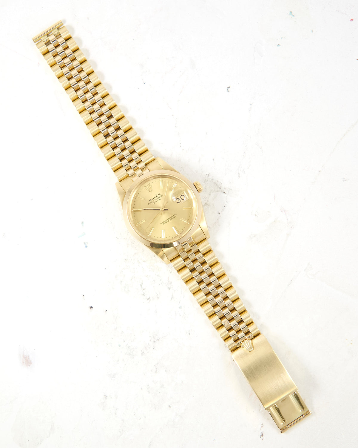 Rolex Date 15007 Smooth Bezel Champagne Dial in 14K Yellow Gold Case and Bracelet