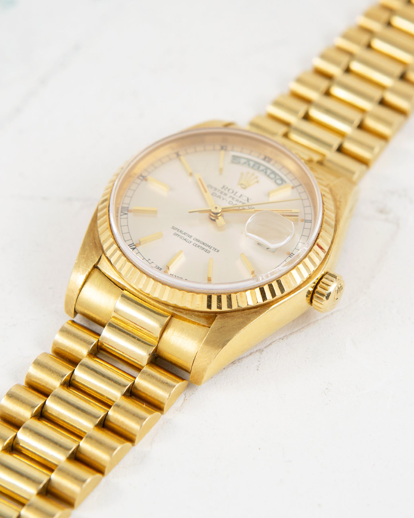 ROLEX DAY-DATE SILVER DIAL IN YELLOW GOLD