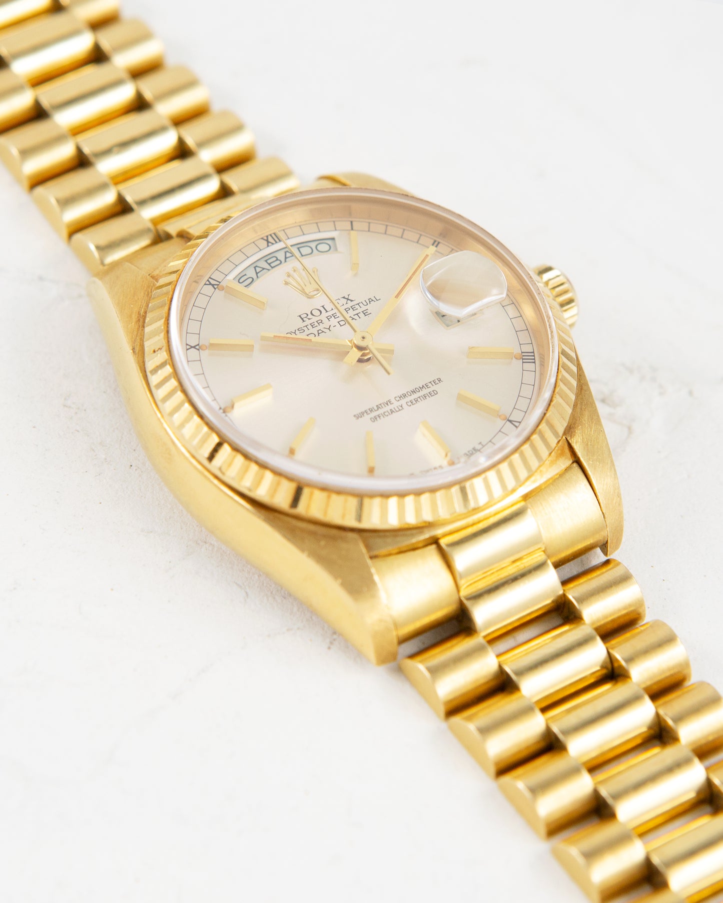 ROLEX DAY-DATE SILVER DIAL IN YELLOW GOLD