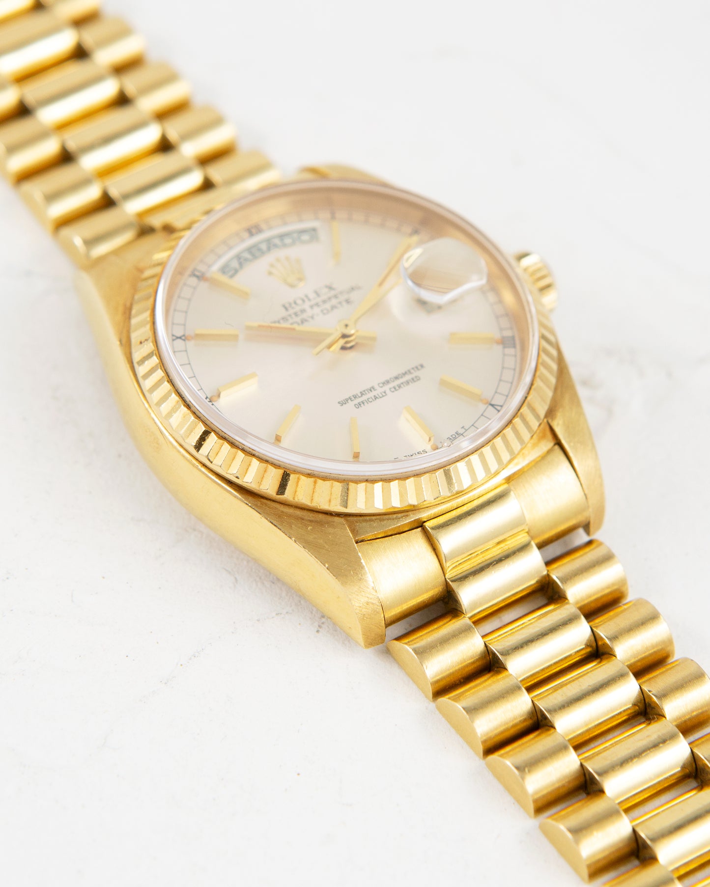 ROLEX DAY-DATE SILVER DIAL IN YELLOW GOLD