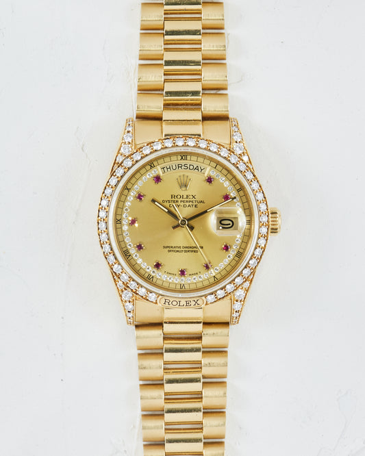 ROLEX DIAMOND RUBY STRING DIAL DAY-DATE