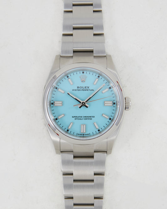 Rolex Oyster Perpetual Turquoise Blue Dial with Box and Papers in Unworn Condition