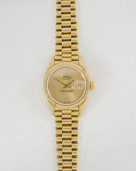 ROLEX LADIES DATEJUST CHAMPAGNE DIAMOND DIAL IN YELLOW GOLD