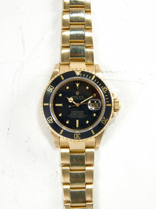 ROLEX SUBMARINER BLACK NIPPLE DIAL IN YELLOW GOLD
