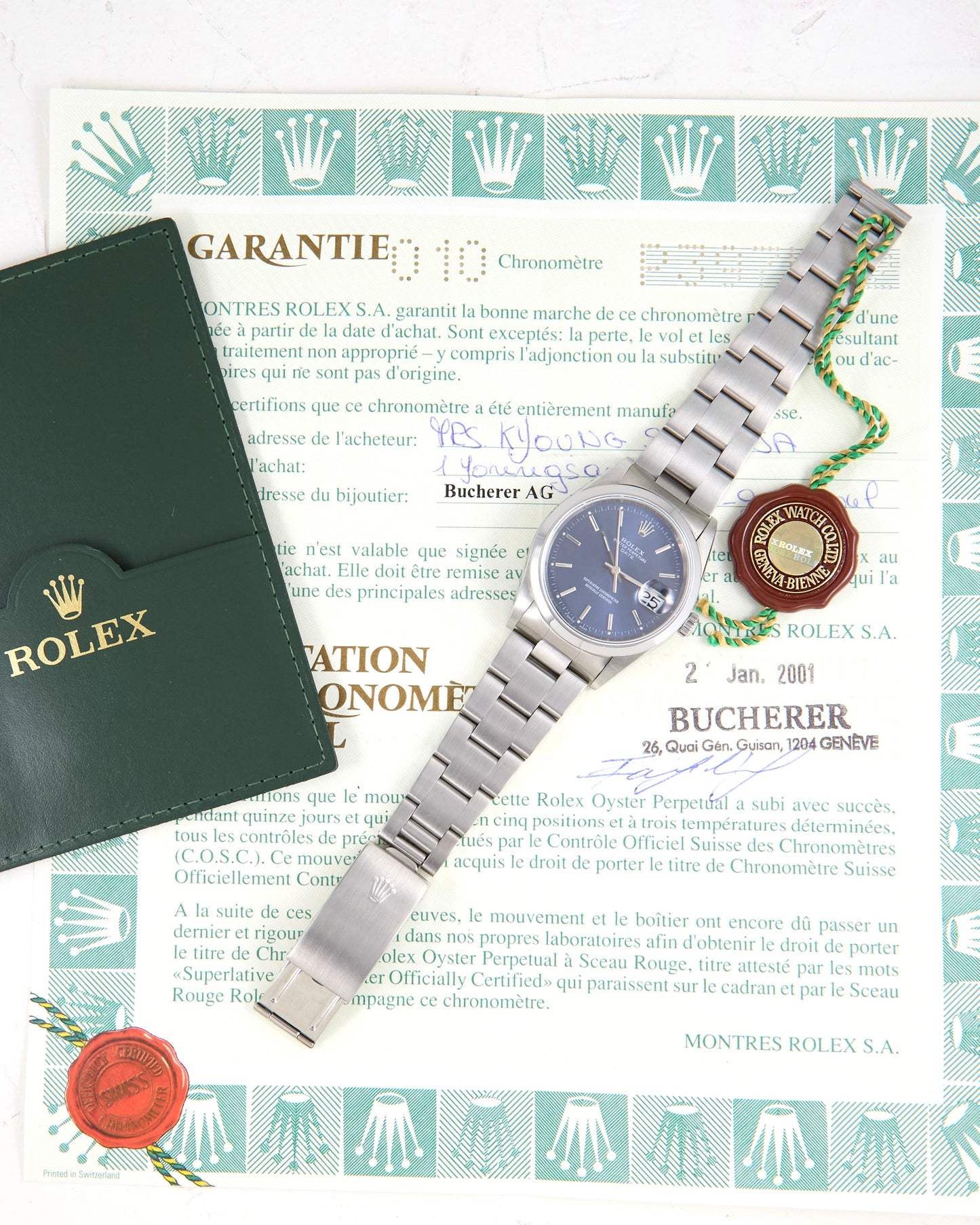 Rolex Date with Blue Dial on Oyster Bracelet with Rolex Papers