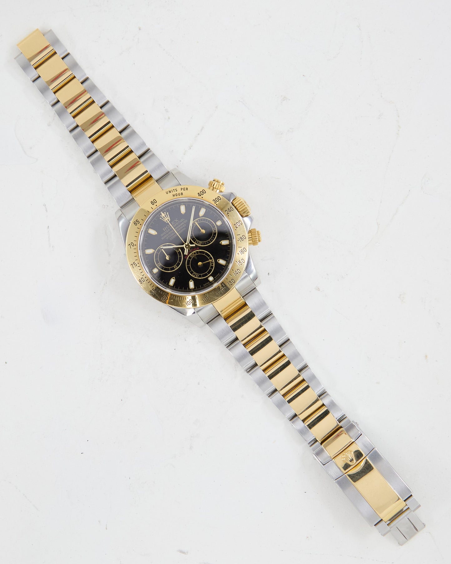 ROLEX DAYTONA BLACK DIAL IN STEEL & GOLD ON OYSTER BRACELET