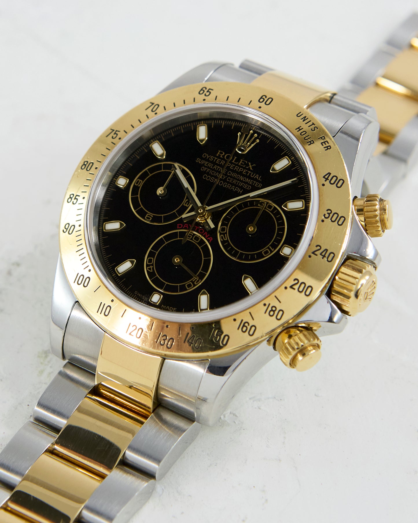 ROLEX DAYTONA BLACK DIAL IN STEEL & GOLD ON OYSTER BRACELET