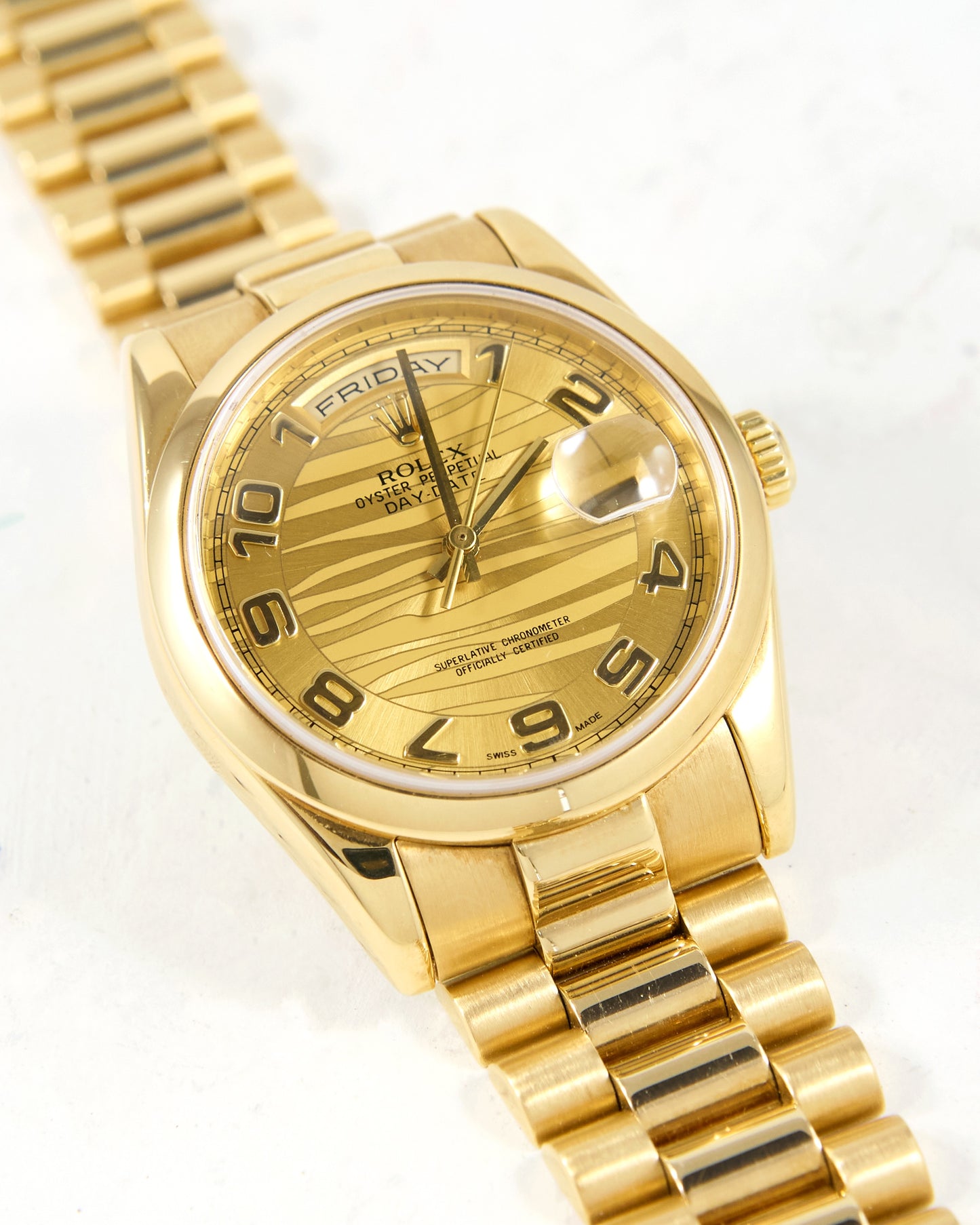 Rolex Day-Date 118208 Smooth Bezel Champagne Wave Dial in Yellow Gold Case and Bracelet
