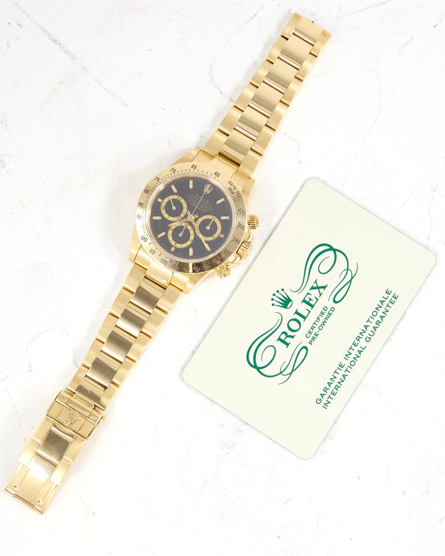 Rolex Daytona 16528 Black Dial Zenith Automatic in Yellow Gold Case with Rolex CPO Card
