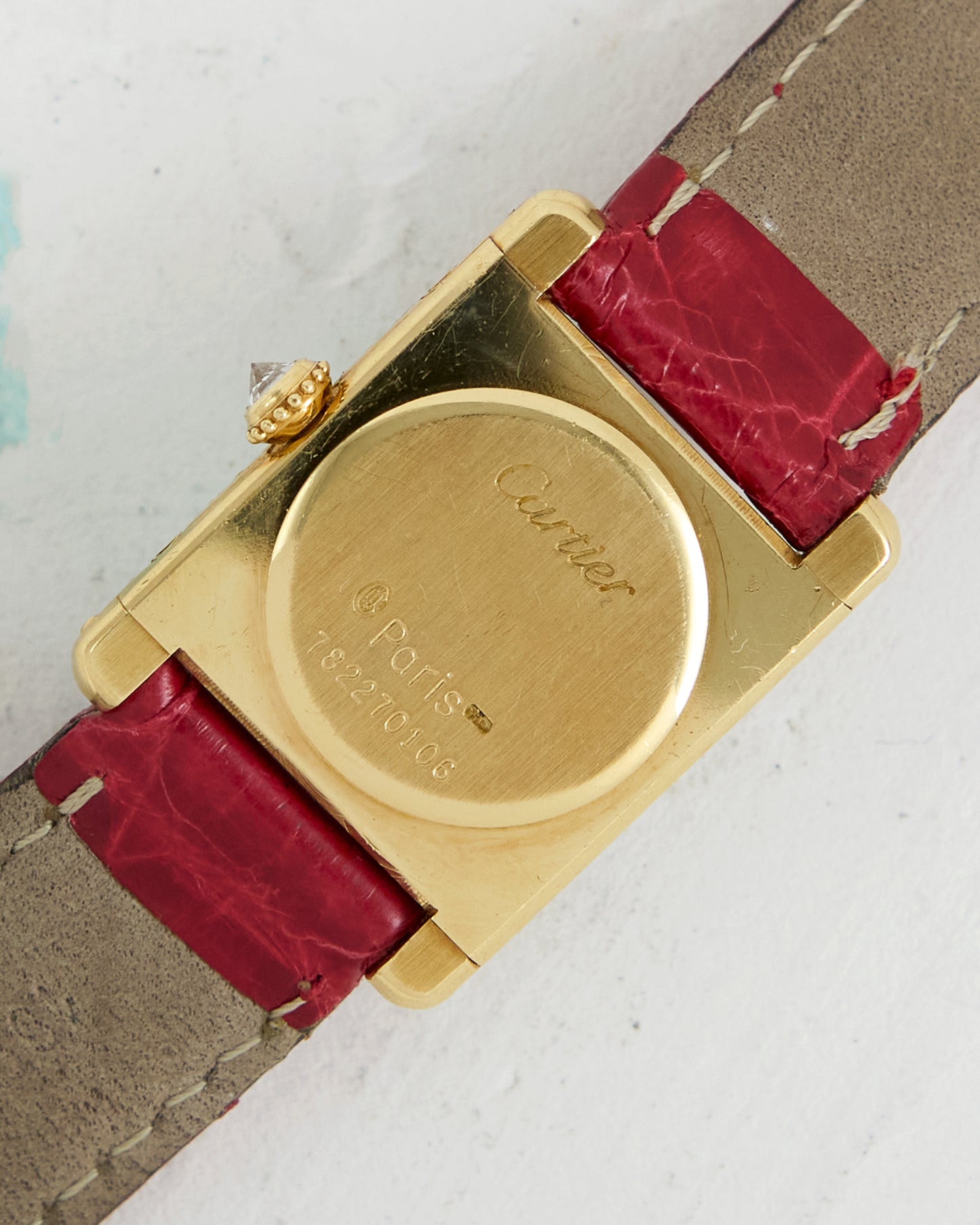 CARTIER TANK LOUIS FACTORY DIAMOND AND RUBY CASE & DIAL IN YELLOW GOLD