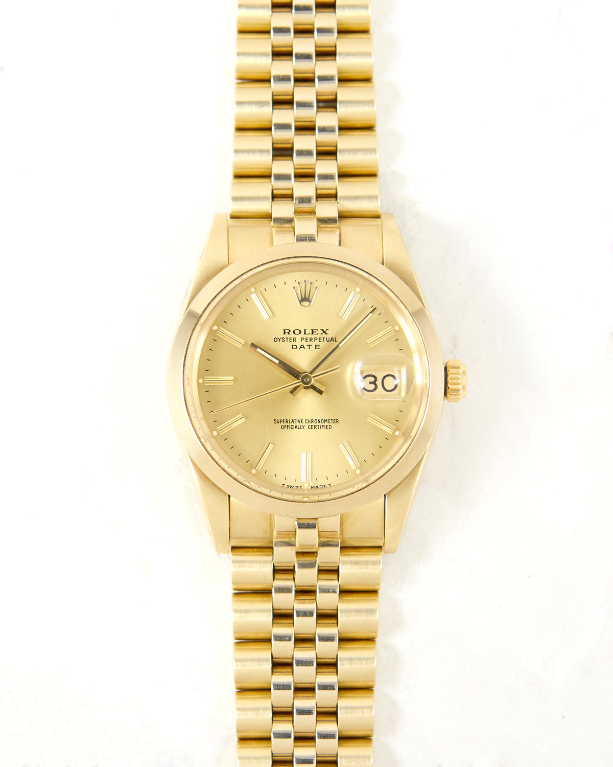 Rolex Date 15007 Smooth Bezel Champagne Dial in 14K Yellow Gold Case and Bracelet