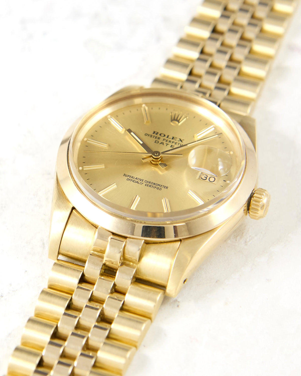 Rolex Date 15007 Smooth Bezel Champagne Dial in 14K Yellow Gold Case and Bracelet