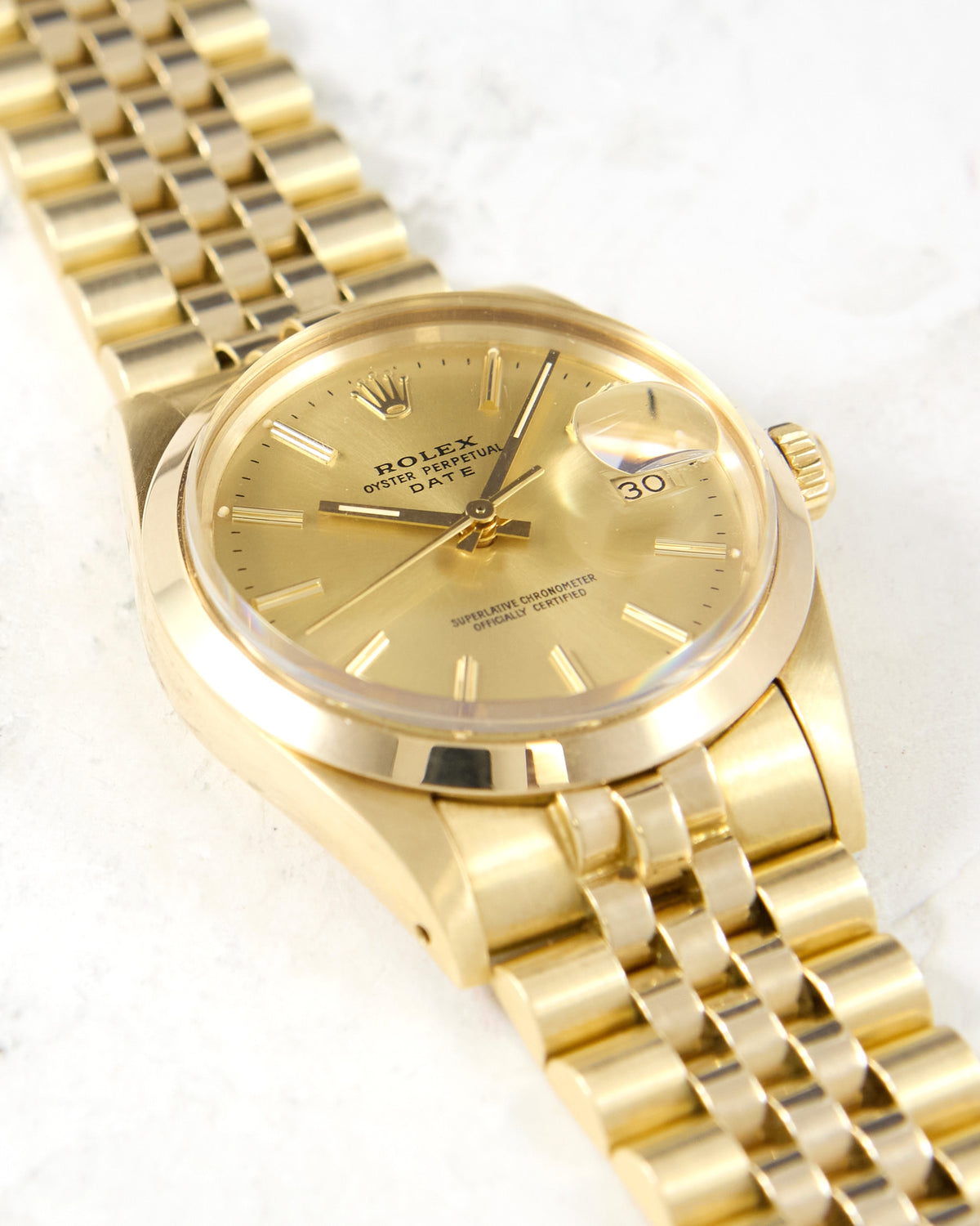 Rolex Date 15007 Smooth Bezel Champagne Dial in 14K Yellow Gold Case and Bracelet