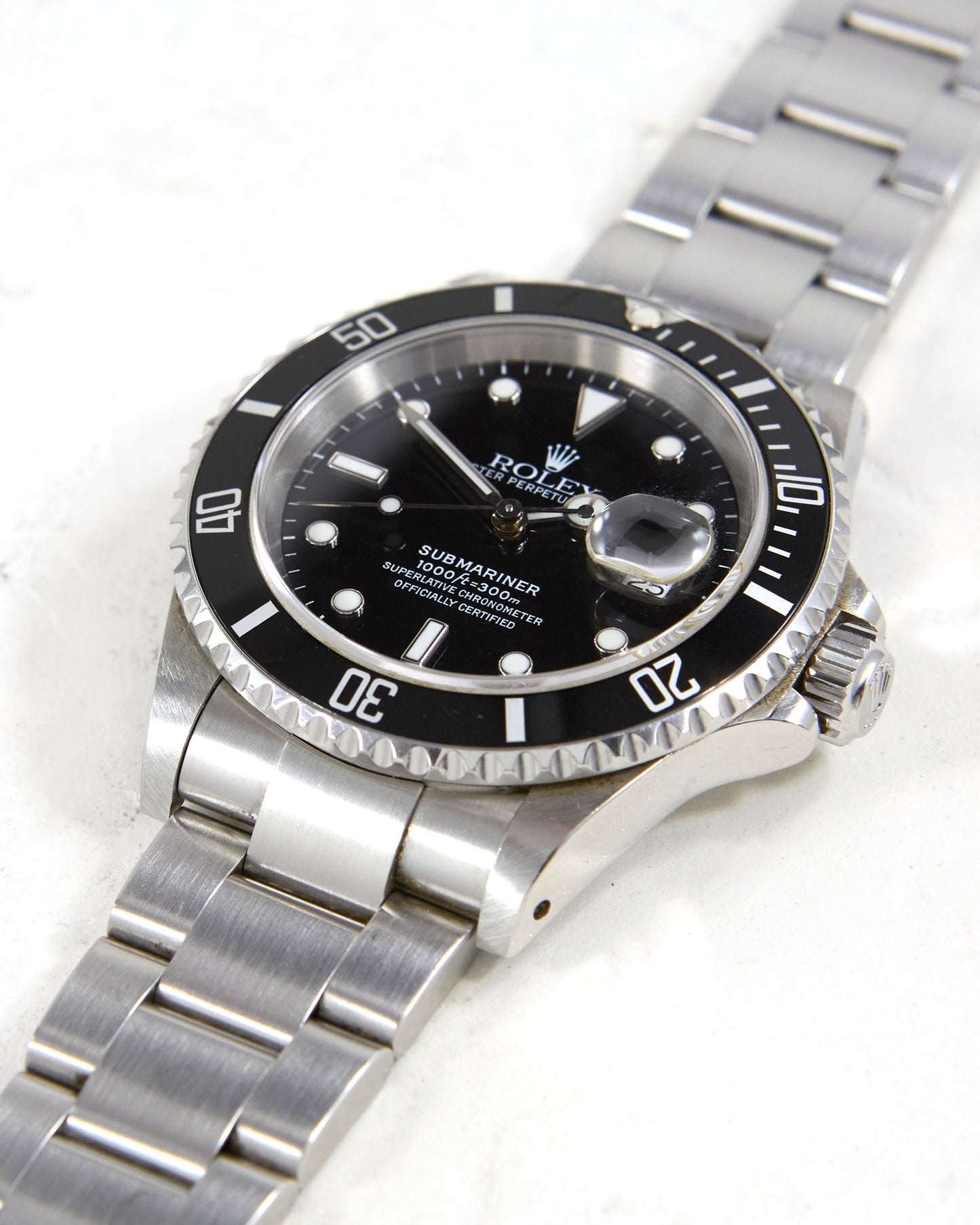 Rolex Submariner 16610 on Oyster Bracelet with Box & Papers