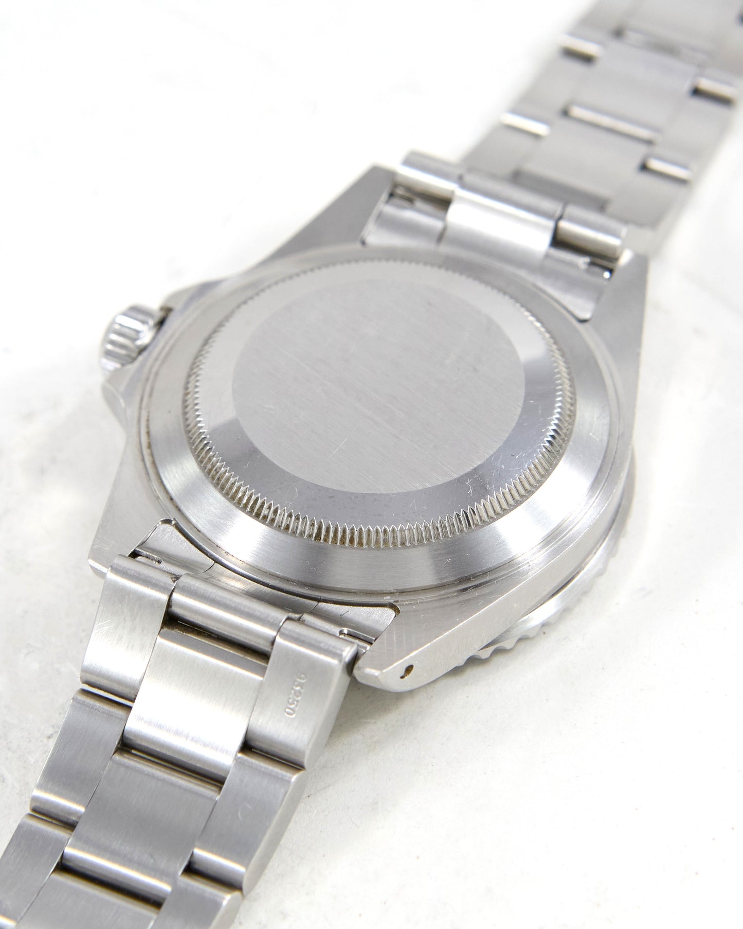 Rolex Submariner 16610 on Oyster Bracelet with Box & Papers