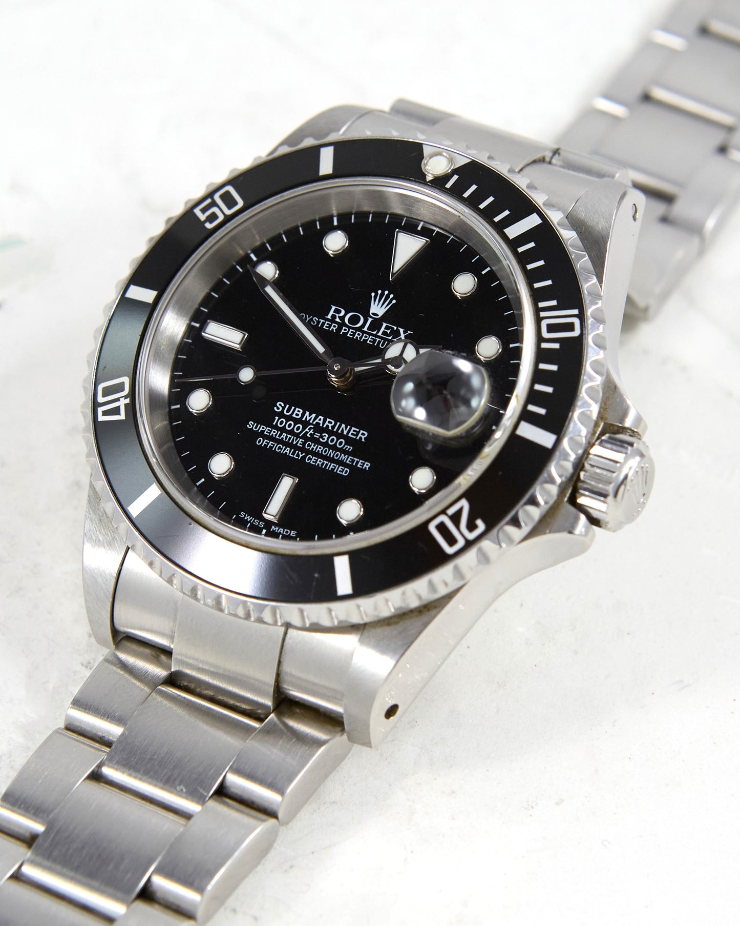 Rolex Submariner 16610 on Oyster Bracelet with Box & Papers