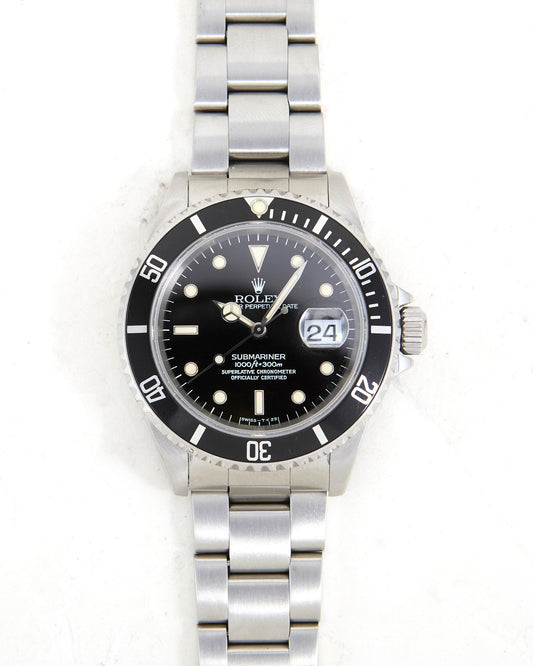 Rolex Submariner 16610 with Creamy Dial and Papers