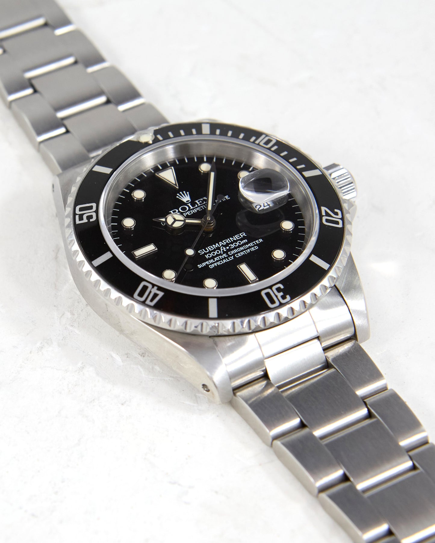 Rolex Submariner 16610 with Creamy Dial and Papers
