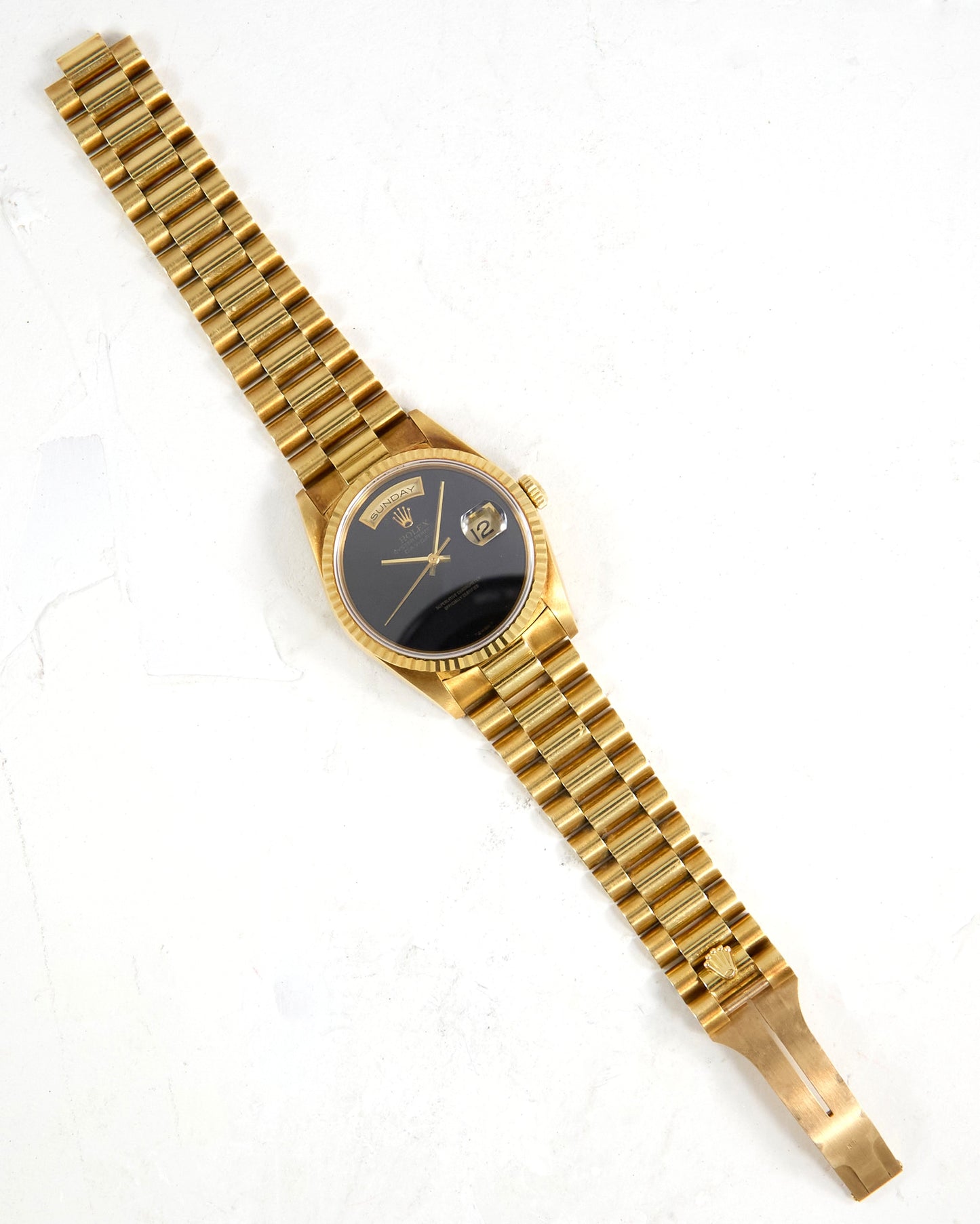 Rolex Day-Date 18238 Onyx Dial in Yellow Gold Case on President Bracelet with Box and Papers - NOS Condition