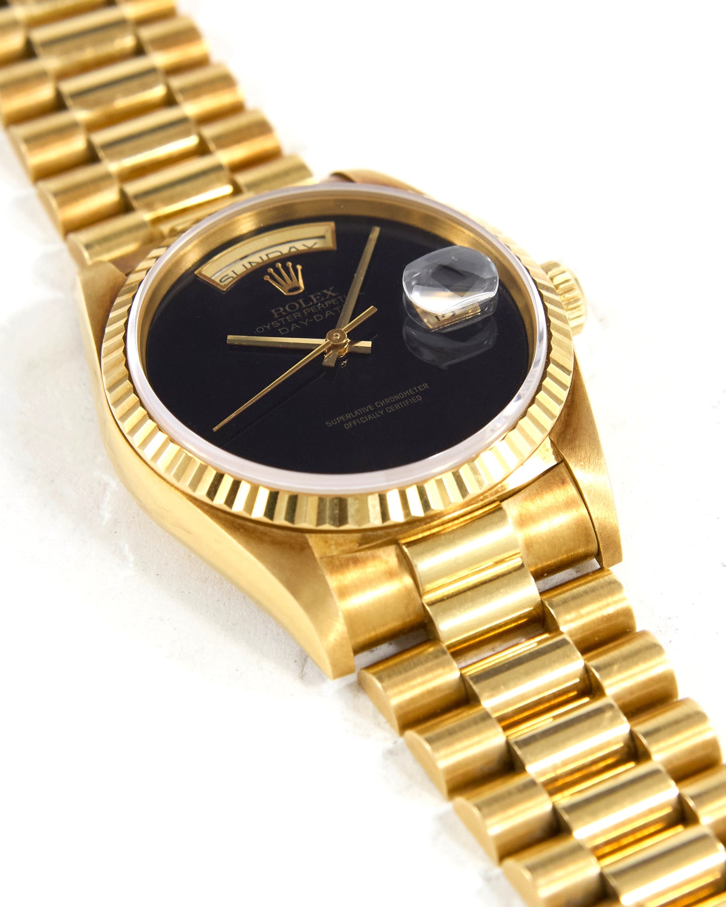 Rolex Day-Date 18238 Onyx Dial in Yellow Gold Case on President Bracelet with Box and Papers - NOS Condition