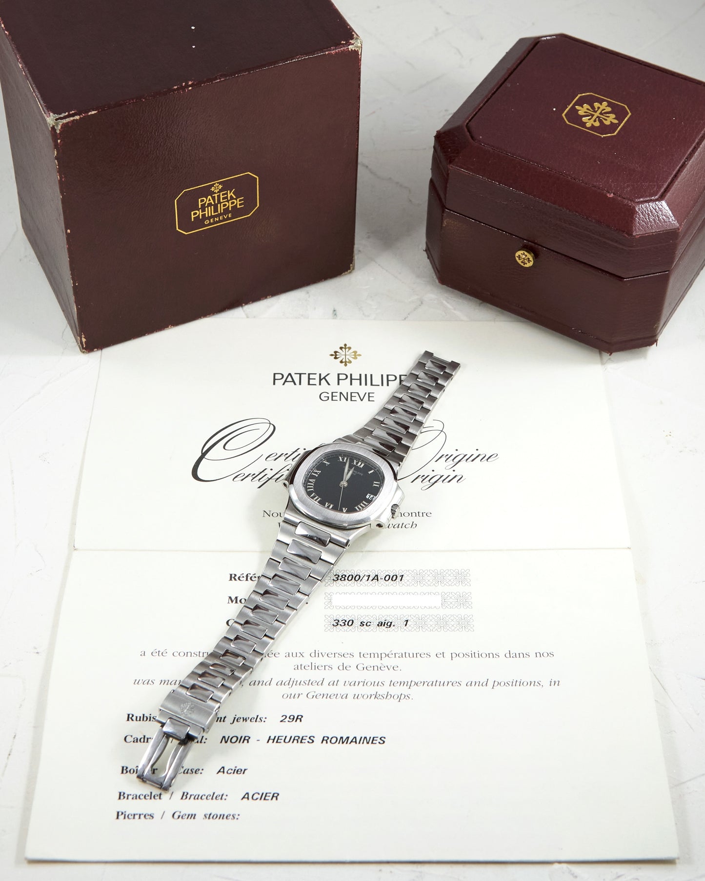 Patek Philippe Nautilus 3800 Black Roman Dial with Box & Papers