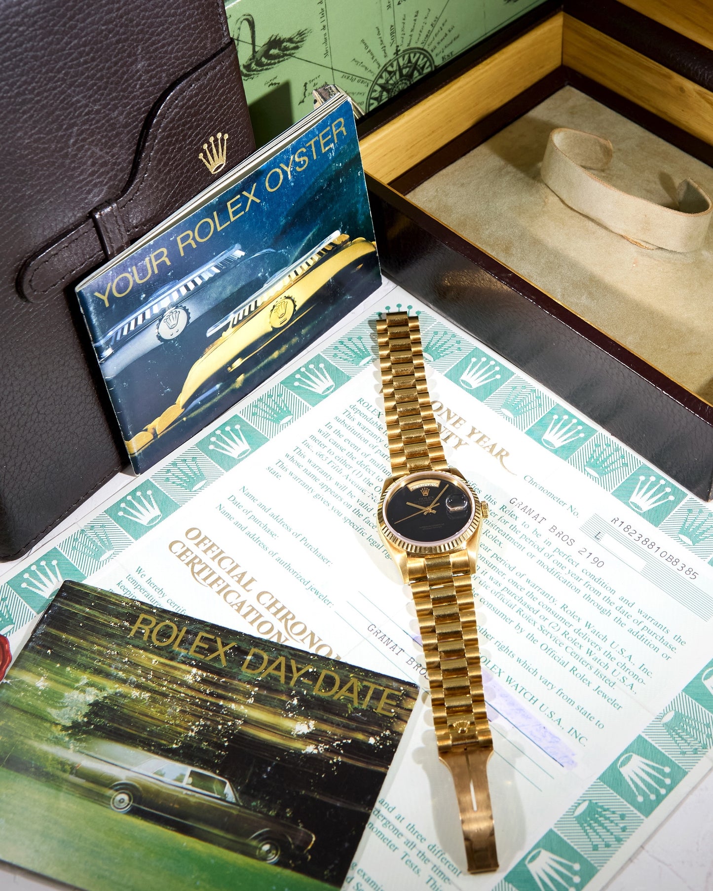 Rolex Day-Date 18238 Onyx Dial in Yellow Gold Case on President Bracelet with Box and Papers - NOS Condition