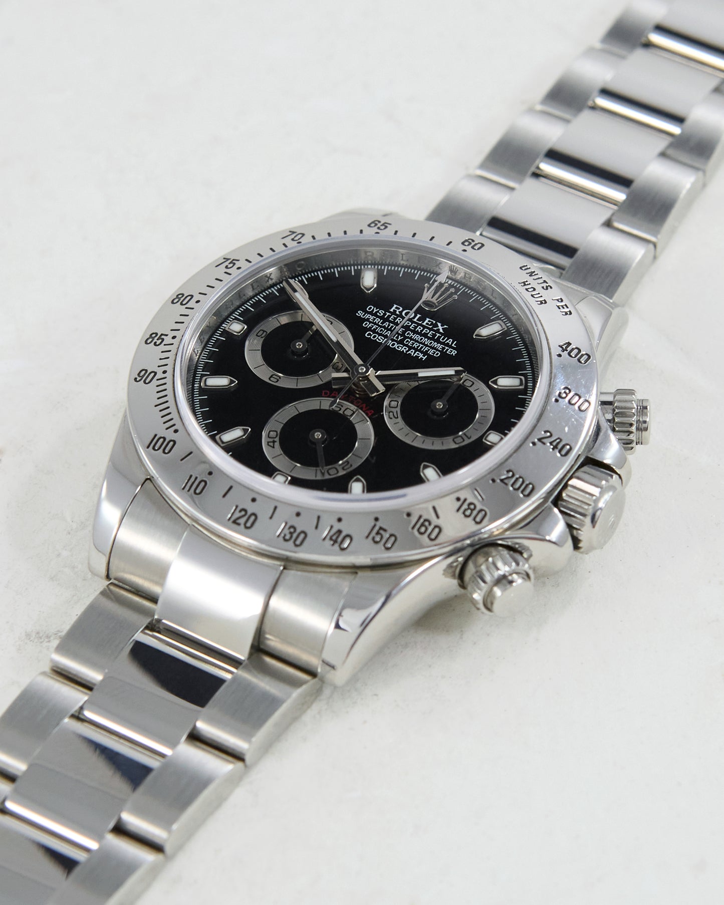 ROLEX DAYTONA BLACK DIAL IN STEEL ON OYSTER BRACELET WITH PAPERS