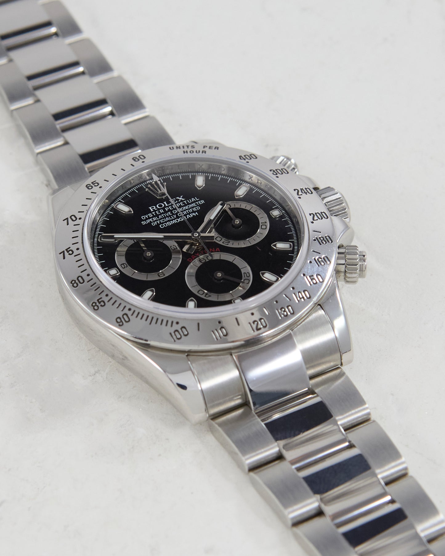 ROLEX DAYTONA BLACK DIAL IN STEEL ON OYSTER BRACELET WITH PAPERS