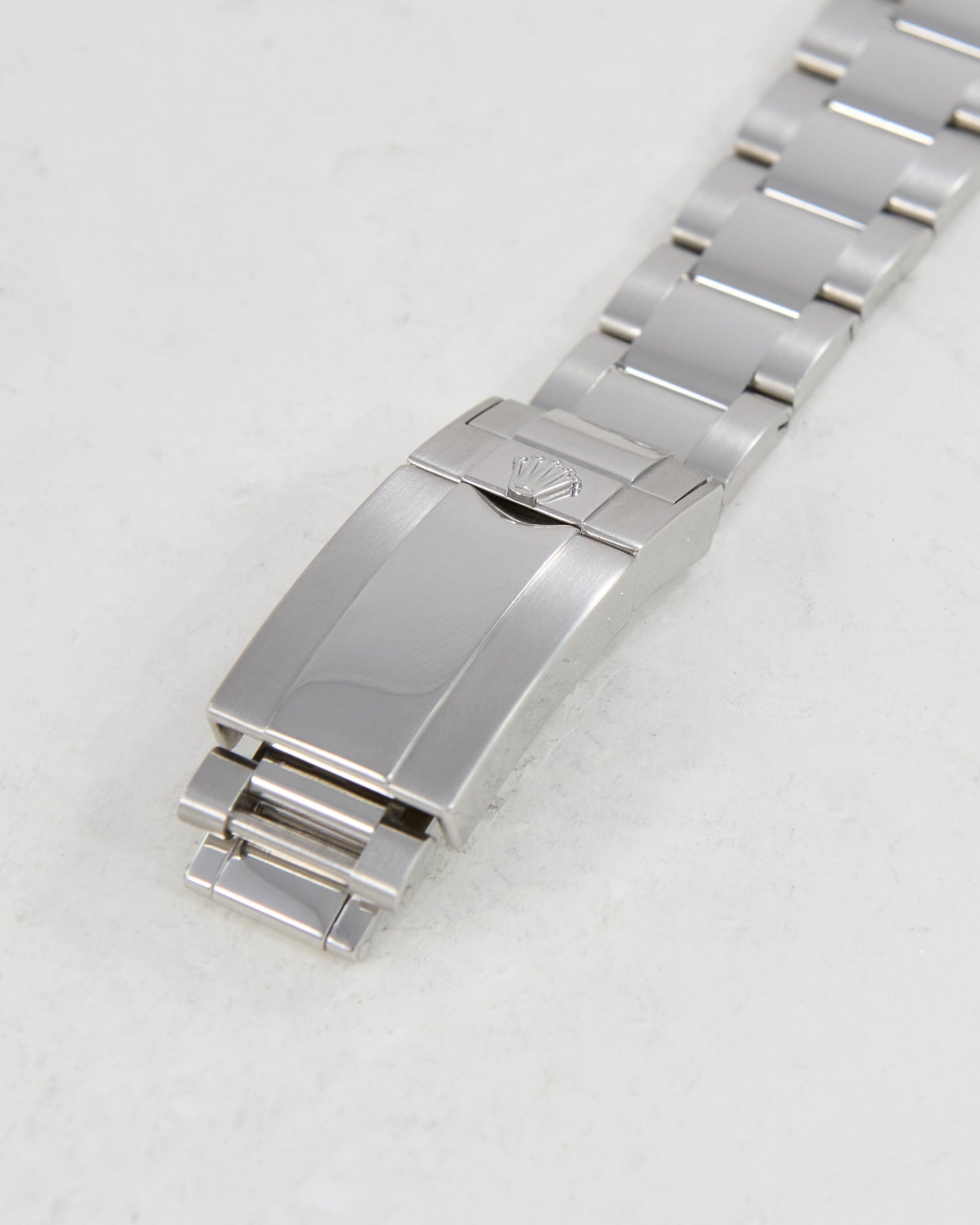 ROLEX DAYTONA BLACK DIAL IN STEEL ON OYSTER BRACELET WITH PAPERS