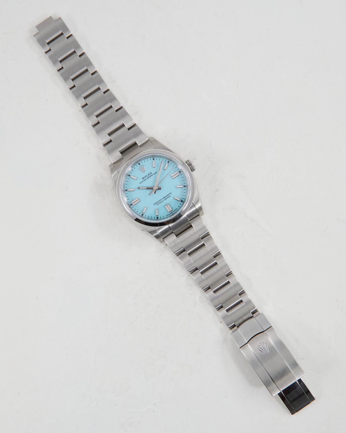 Rolex Oyster Perpetual Turquoise Blue Dial with Box and Papers in Unworn Condition