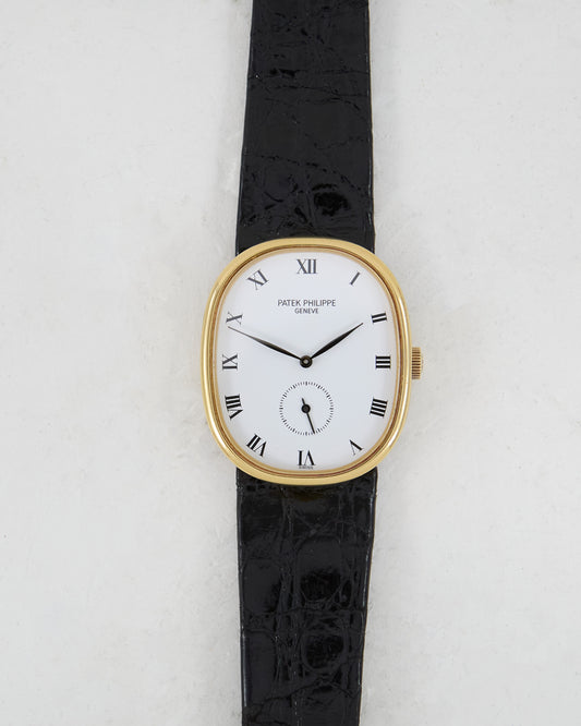 Patek Philippe Ellipse White Roman Dial in 18K Yellow Gold with Patek Philippe Strap and Buckle