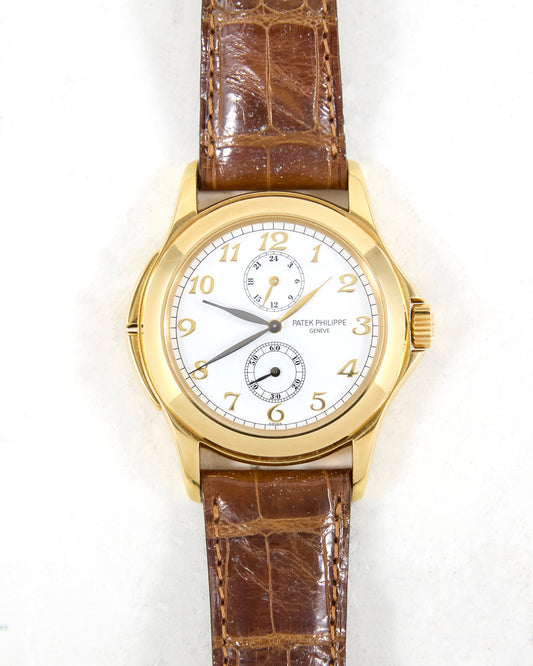 Patek Philippe Calatrava Travel Time 5134J in Yellow Gold with Leather Strap and Deployant Buckle with Box & Papers