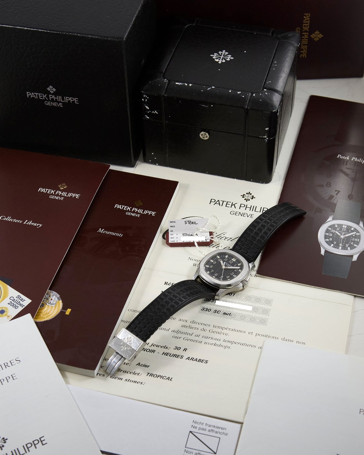 Patek Philippe Aquanaut 5066A with Box and Papers & Extra Factory Straps