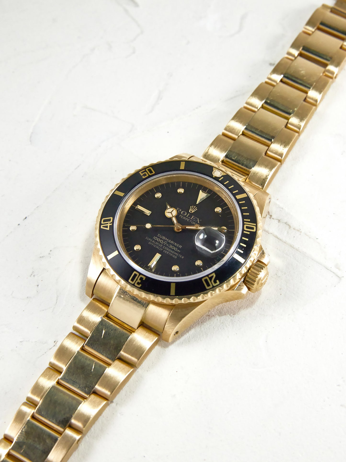 ROLEX SUBMARINER BLACK NIPPLE DIAL IN YELLOW GOLD
