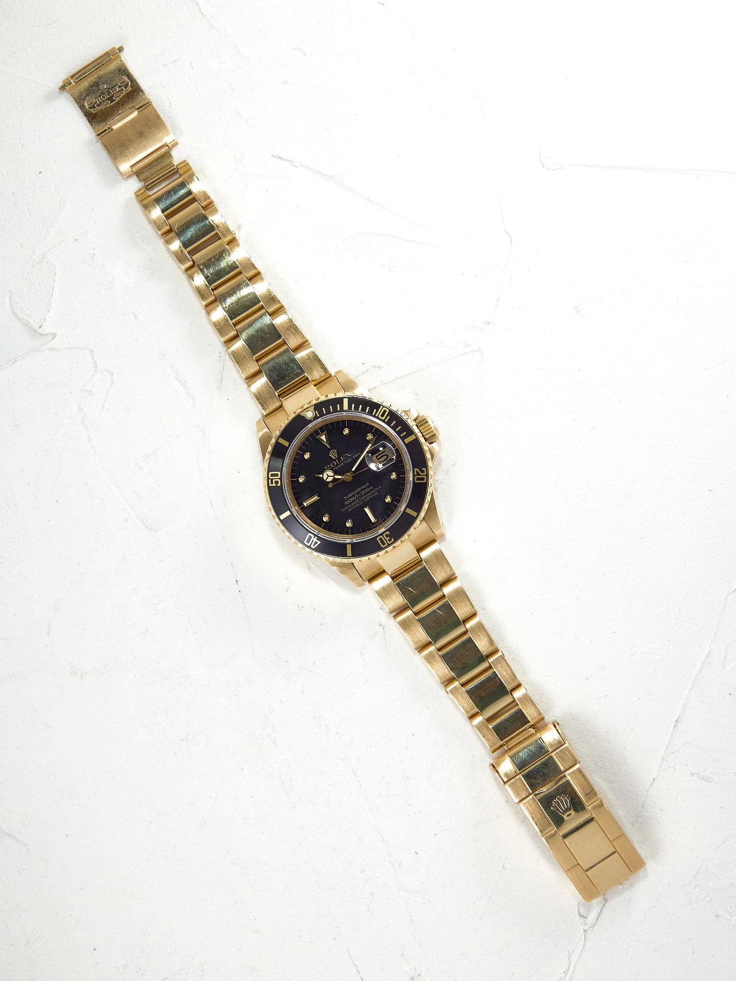 ROLEX SUBMARINER BLACK NIPPLE DIAL IN YELLOW GOLD