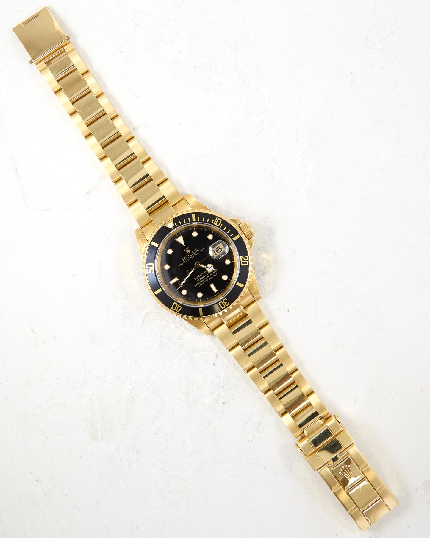 Rolex Submariner 16618 Black Dial in Yellow Gold with Box & Papers - New Old Stock Condition