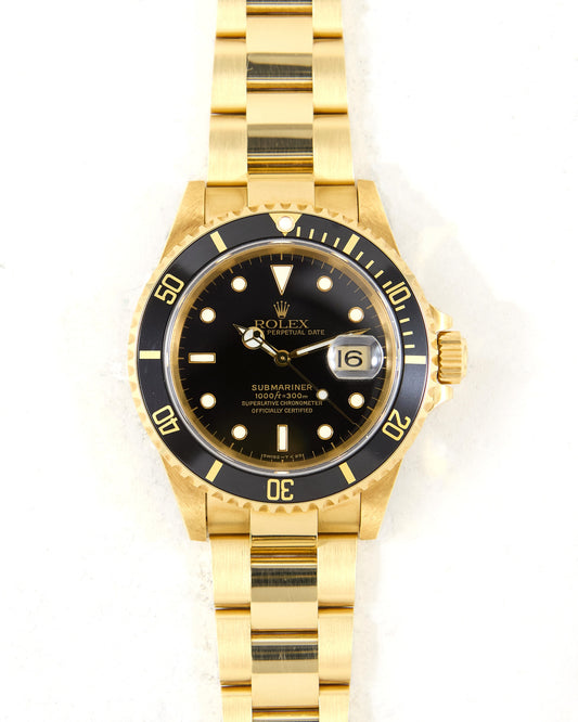 Rolex Submariner 16618 Black Dial in Yellow Gold with Box & Papers - New Old Stock Condition