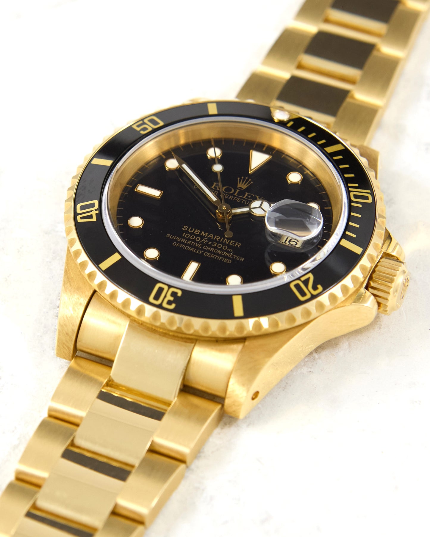 Rolex Submariner 16618 Black Dial in Yellow Gold with Box & Papers - New Old Stock Condition