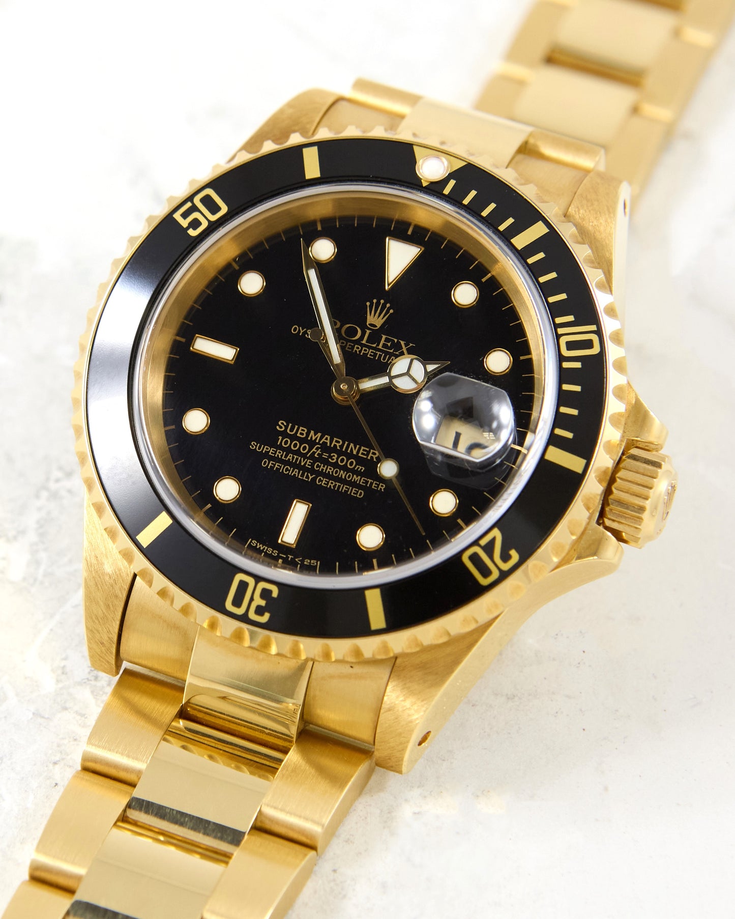 Rolex Submariner 16618 Black Dial in Yellow Gold with Box & Papers - New Old Stock Condition