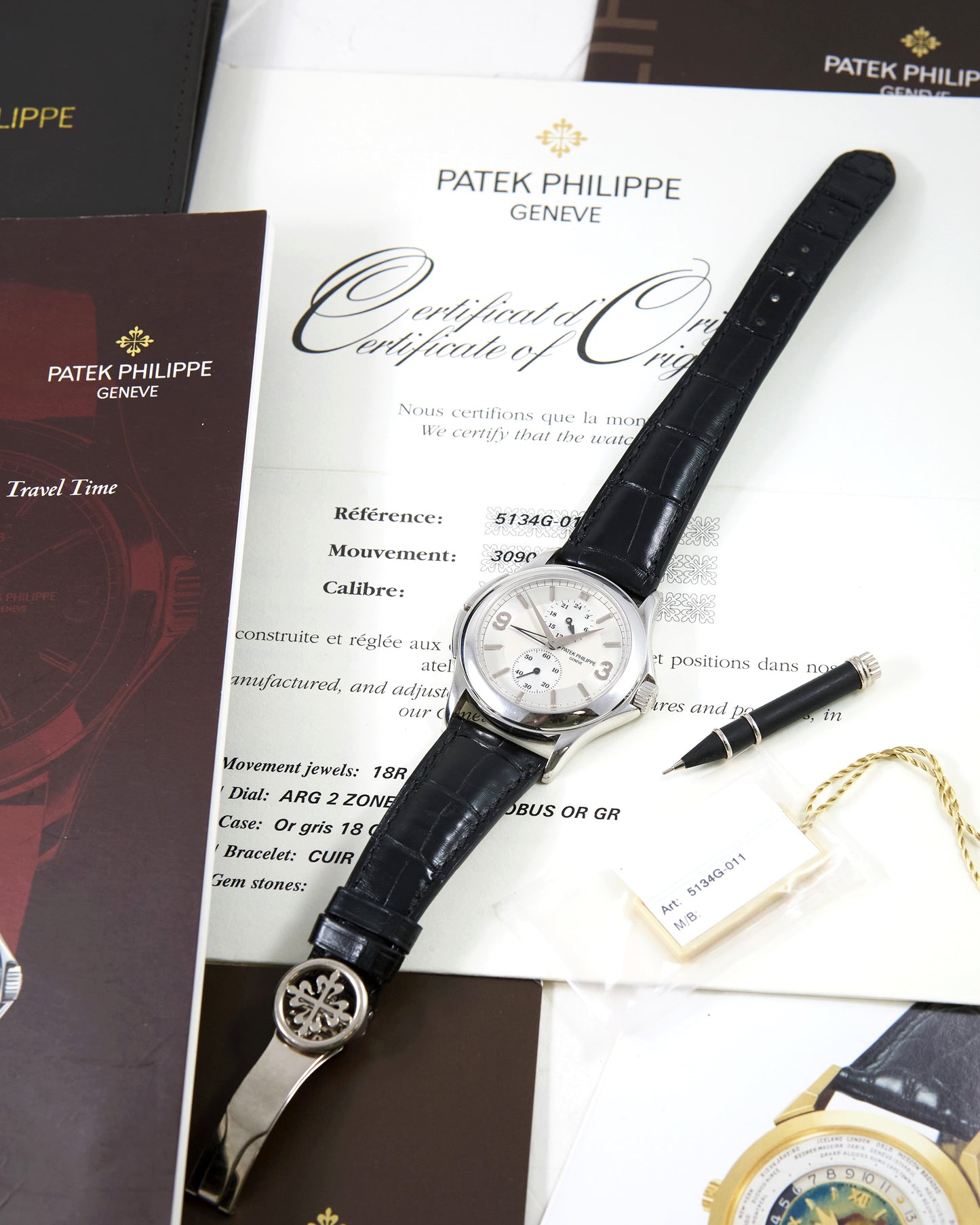 Patek Philippe Calatrava Travel Time 5134G in White Gold with Leather Strap and Deployant Bucke with Papers