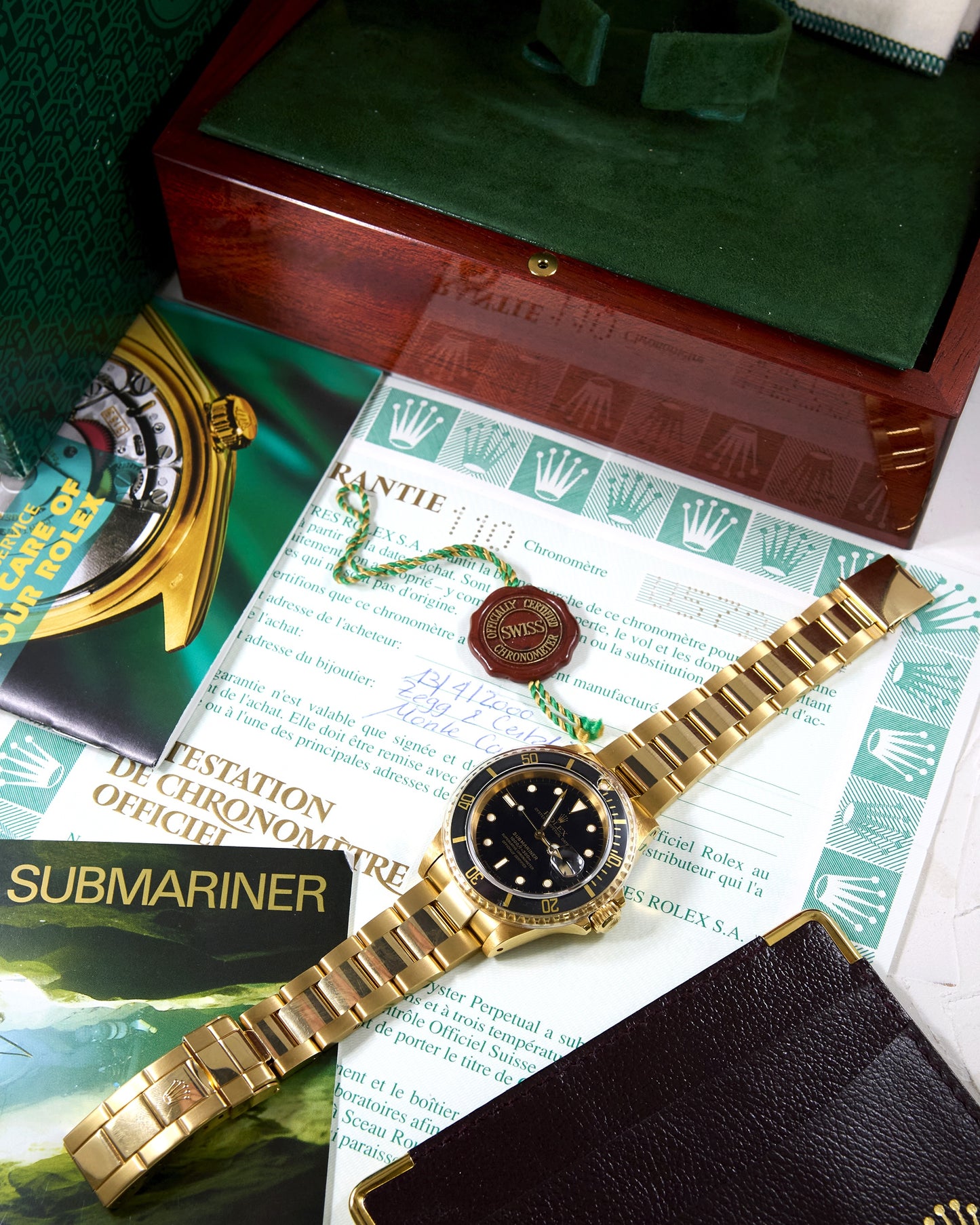 Rolex Submariner 16618 Black Dial in Yellow Gold with Box & Papers - New Old Stock Condition