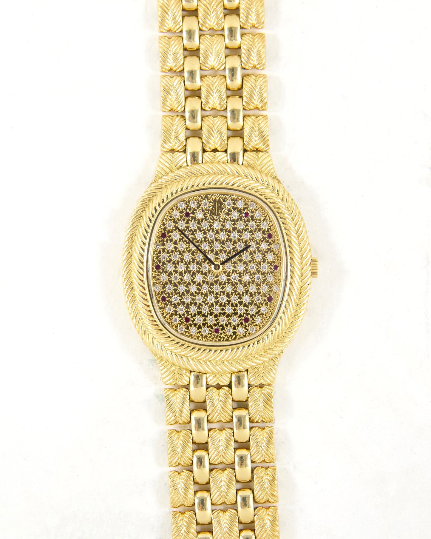 Audemars Piguet Feather 56455BA Diamond Pave Dial with Rubies in Yellow Gold Case and Bracelet