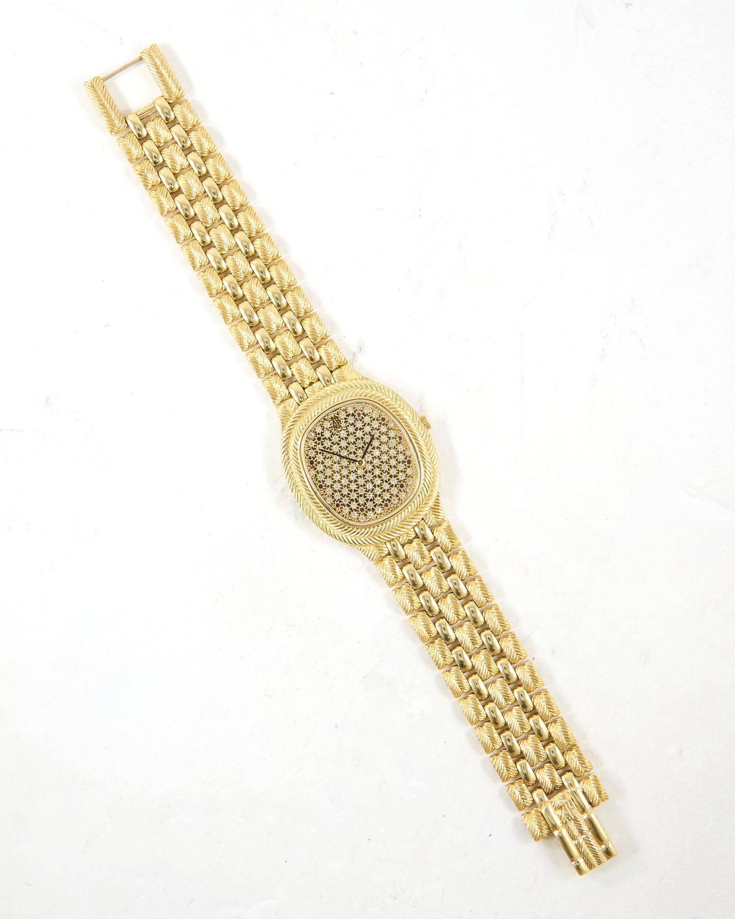 Audemars Piguet Feather 56455BA Diamond Pave Dial with Rubies in Yellow Gold Case and Bracelet