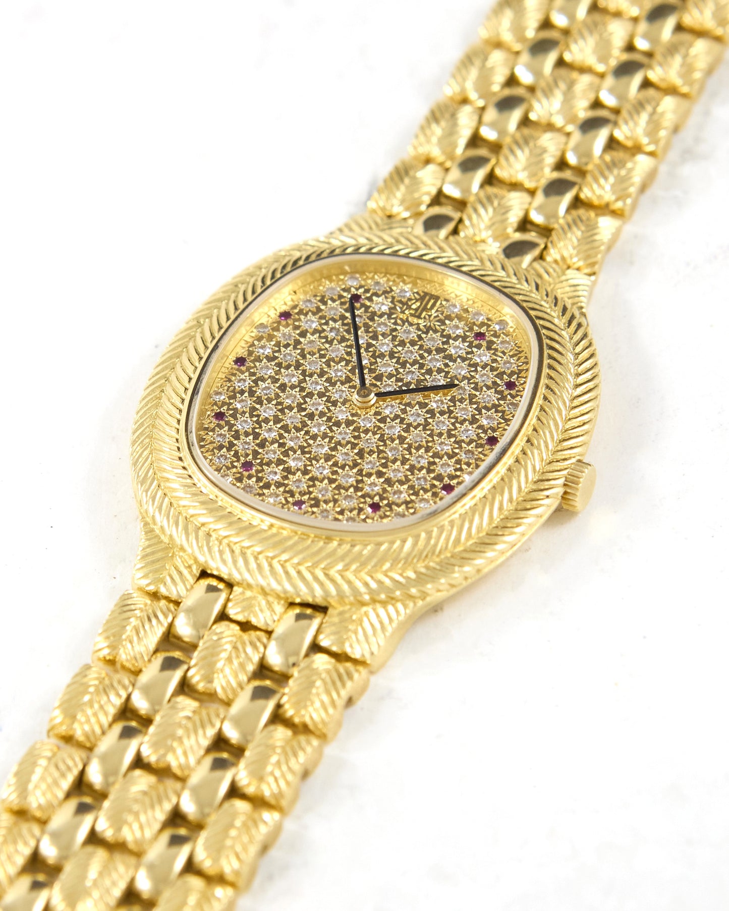 Audemars Piguet Feather 56455BA Diamond Pave Dial with Rubies in Yellow Gold Case and Bracelet
