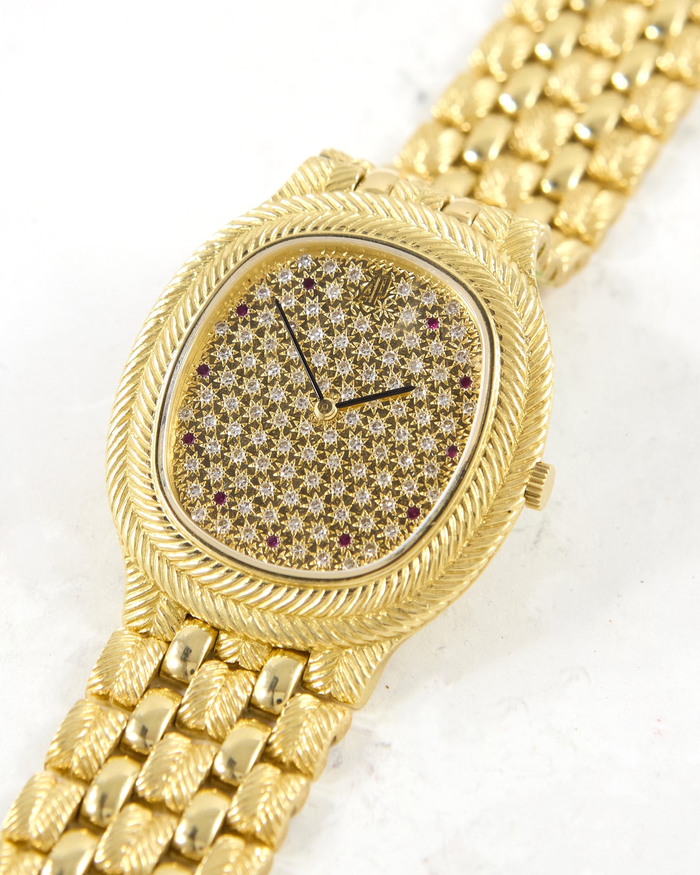 Audemars Piguet Feather 56455BA Diamond Pave Dial with Rubies in Yellow Gold Case and Bracelet