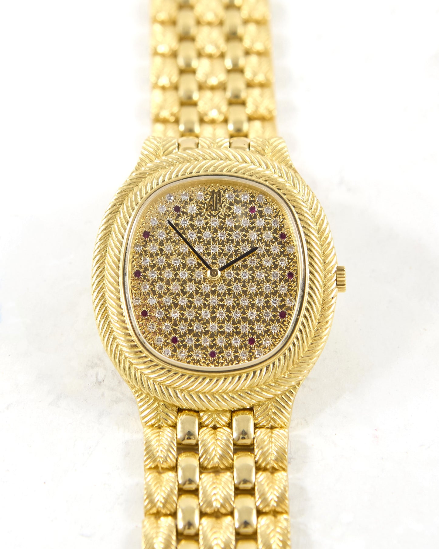 Audemars Piguet Feather 56455BA Diamond Pave Dial with Rubies in Yellow Gold Case and Bracelet